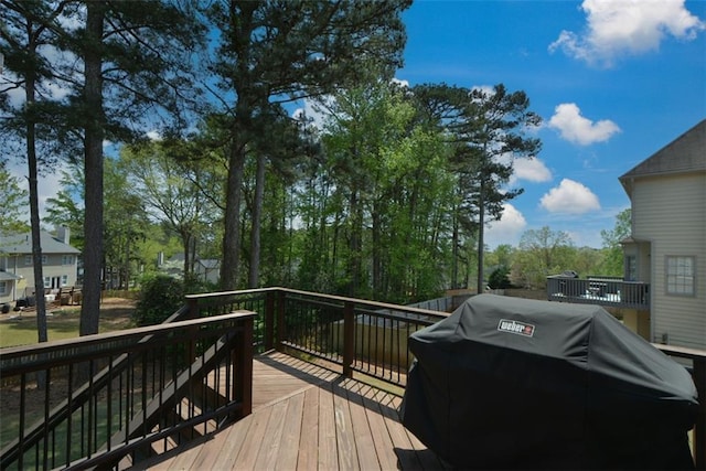 wooden deck with area for grilling