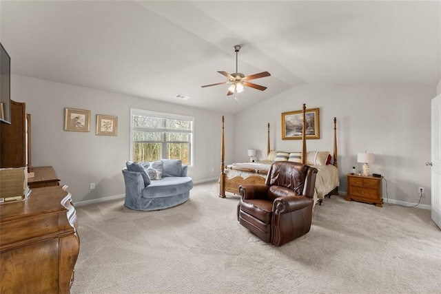 bedroom featuring ceiling fan, light colored carpet, and lofted ceiling