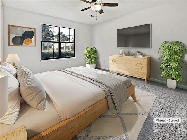 carpeted bedroom with ceiling fan