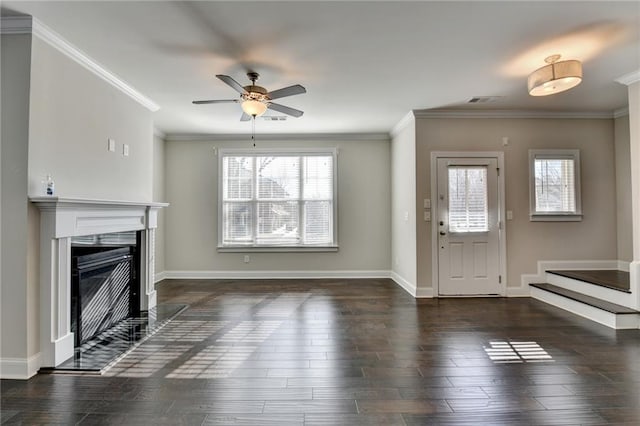 entryway featuring dark hardwood / wood-style floors, ceiling fan, and crown molding