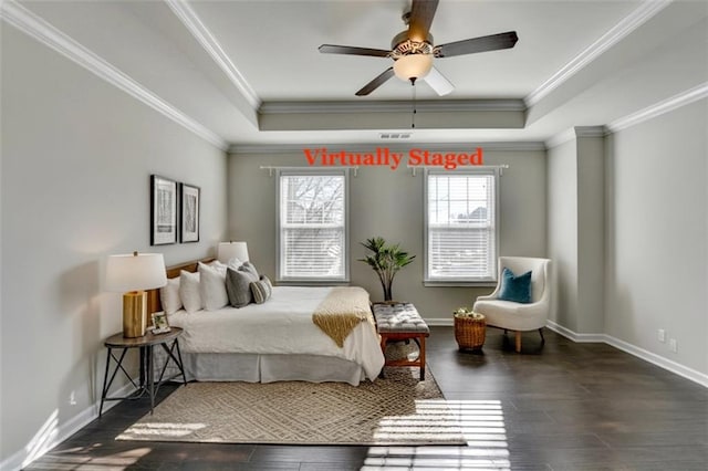 bedroom with a raised ceiling, ceiling fan, dark hardwood / wood-style flooring, and ornamental molding