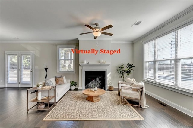 sitting room featuring crown molding, dark hardwood / wood-style flooring, and ceiling fan