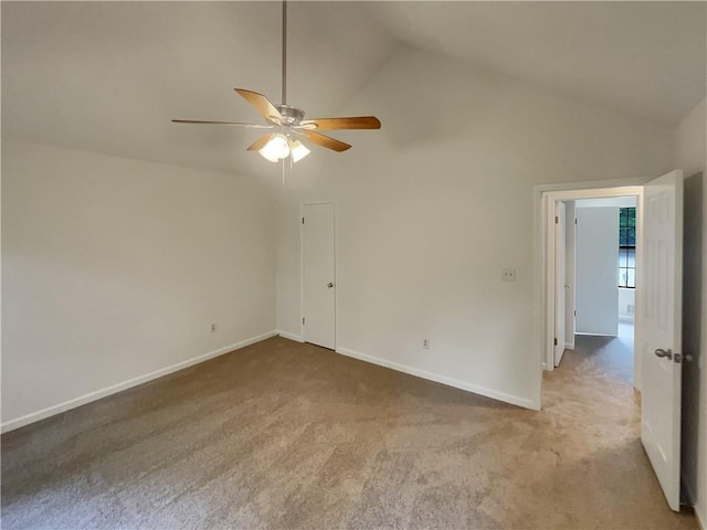 320 Rebecca Lake Way, Fairburn, GA 30213 - empty room with ceiling fan, lofted ceiling, light carpet, and baseboards