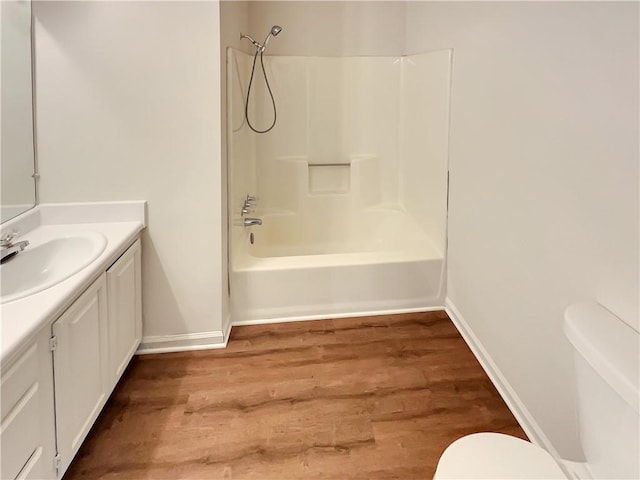 320 Rebecca Lake Way, Fairburn, GA 30213 - kitchen with appliances with stainless steel finishes, a ceiling fan, under cabinet range hood, a sink, and dark wood-type flooring
