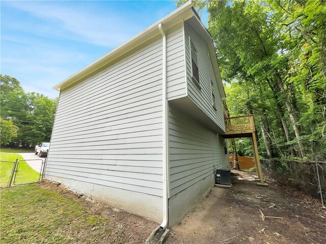 320 Rebecca Lake Way, Fairburn, GA 30213 - view of property exterior with fence, a gate, and central air condition unit