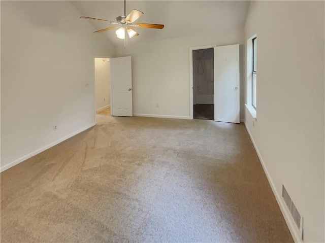 320 Rebecca Lake Way, Fairburn, GA 30213 - carpeted spare room with vaulted ceiling, a ceiling fan, and baseboards