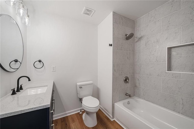 3850 Laurel Dr NW, Acworth, GA 30101 - bathroom featuring vanity, wood finished floors, and shower / tub combination