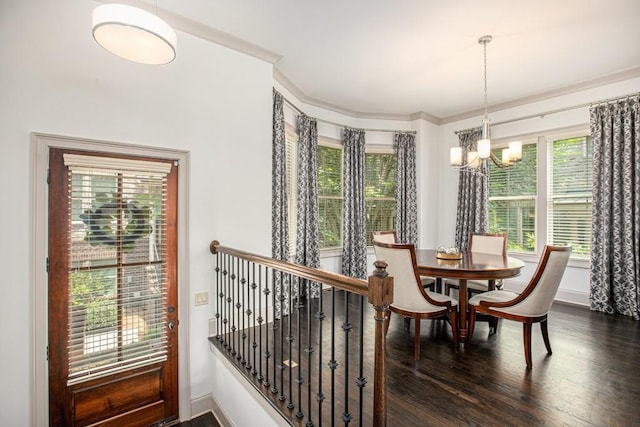 1216 Virginia Ct NE Unit 8, Atlanta, GA 30306 - dining room featuring a chandelier, crown molding, dark wood-style floors, and baseboards