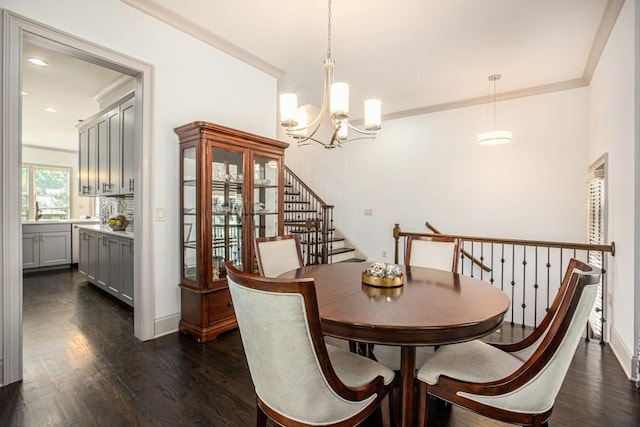 1216 Virginia Ct NE Unit 8, Atlanta, GA 30306 - dining space featuring a chandelier, dark wood-style floors, crown molding, and baseboards
