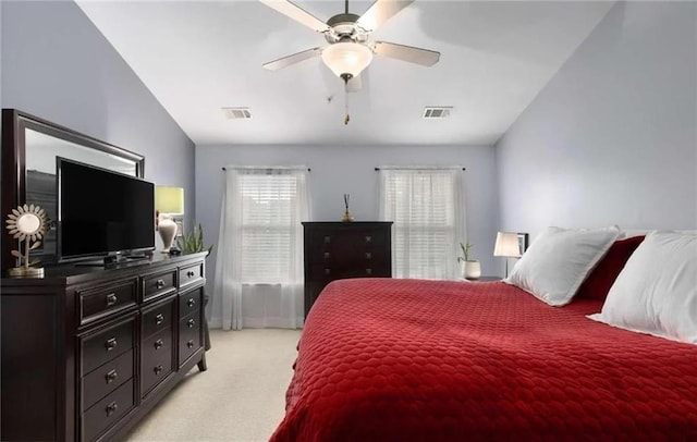 6038 Mayfield Way SE, Mableton, GA 30126 - bedroom with light colored carpet, vaulted ceiling, and a ceiling fan