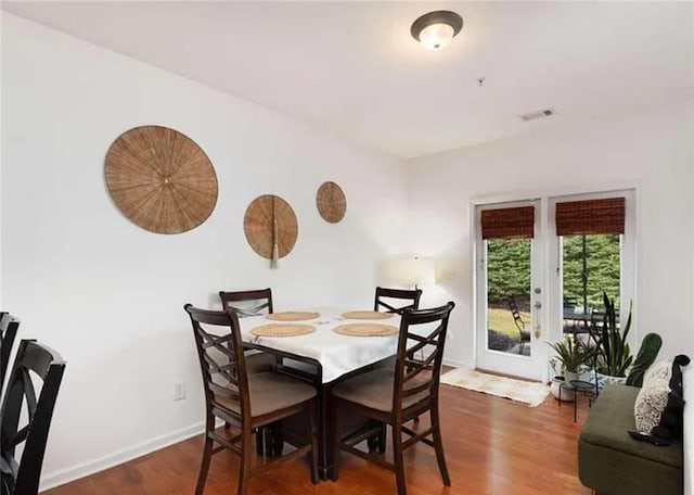 6038 Mayfield Way SE, Mableton, GA 30126 - dining room featuring wood finished floors and baseboards