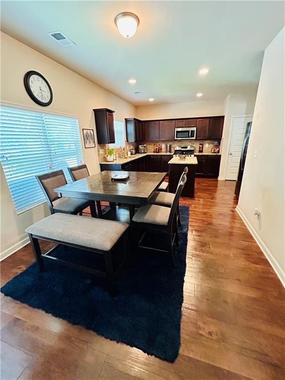 5848 Rex Ridge Loop, Rex, GA 30273 - dining space with dark wood finished floors, baseboards, and recessed lighting