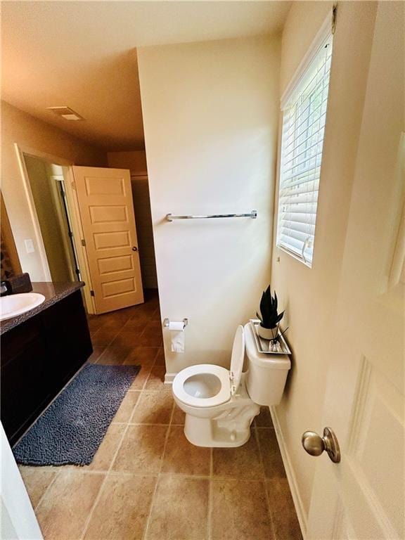5848 Rex Ridge Loop, Rex, GA 30273 - bathroom featuring toilet, vanity, and tile patterned floors