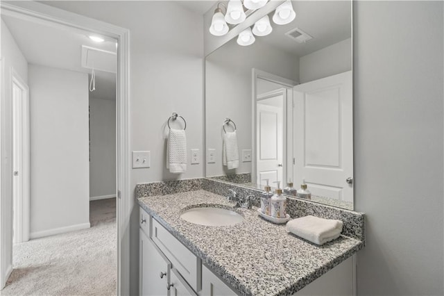 bathroom with vanity with extensive cabinet space