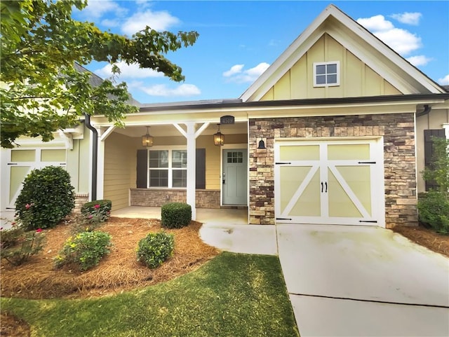 craftsman-style house with a porch and a garage