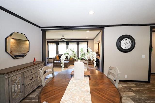 dining area featuring recessed lighting, baseboards, crown molding, and wood finished floors