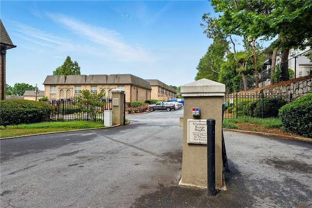 6980 Roswell Rd # A8, Atlanta, GA 30328 - view of asphalt road featuring curbs