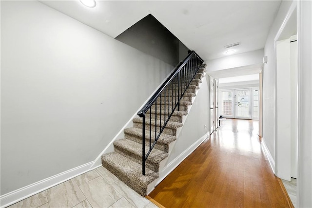 6980 Roswell Rd # A8, Atlanta, GA 30328 - staircase featuring baseboards and french doors