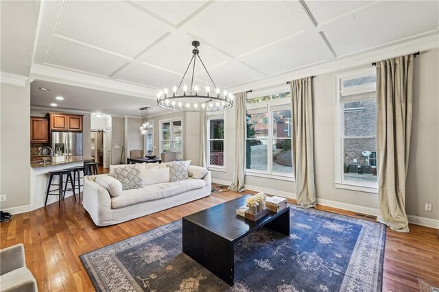 office area with ceiling fan, ornamental molding, and hardwood / wood-style flooring