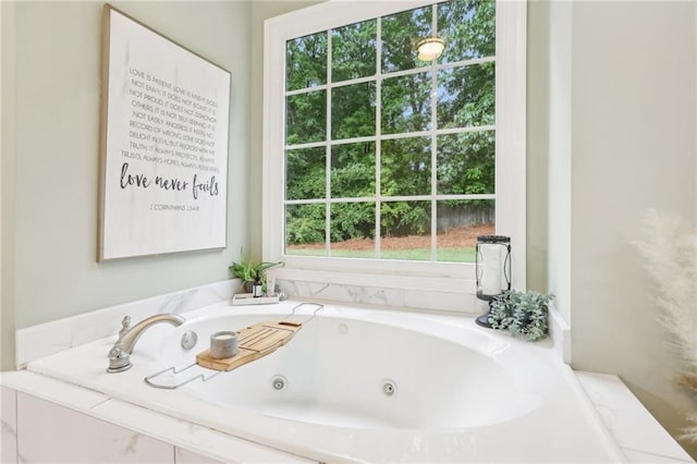 full bath featuring a whirlpool tub