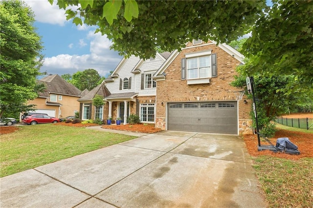 view of front of property with an attached garage, concrete driveway, and brick siding
