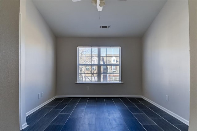 unfurnished room featuring ceiling fan