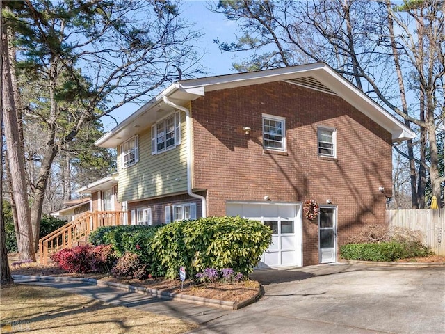 view of side of property featuring a garage