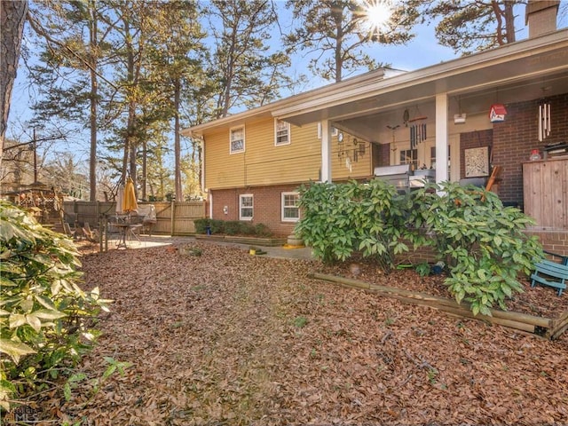 rear view of house featuring a patio area