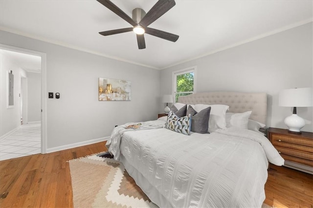 2272 Desmond Dr, Decatur, GA 30033 - bedroom featuring wood finished floors, crown molding, baseboards, and a ceiling fan