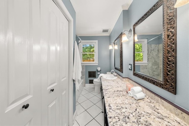 2272 Desmond Dr, Decatur, GA 30033 - bathroom featuring ornamental molding, toilet, tile patterned flooring, baseboards, and vanity