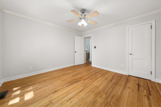 2272 Desmond Dr, Decatur, GA 30033 - unfurnished bedroom with light wood-style flooring, baseboards, and ornamental molding