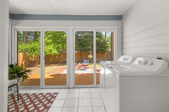 2272 Desmond Dr, Decatur, GA 30033 - laundry area featuring washer and clothes dryer and light tile patterned flooring