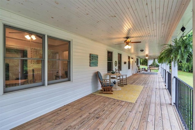wooden terrace featuring a porch