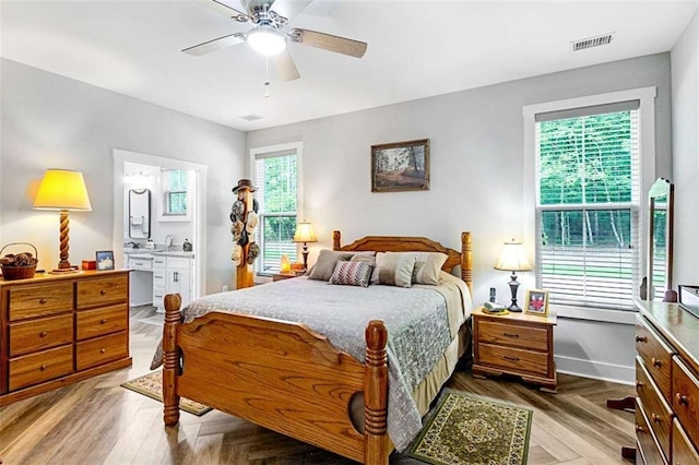 1505 Willis Rd, Barnesville, GA 30204 - bedroom featuring connected bathroom and ceiling fan
