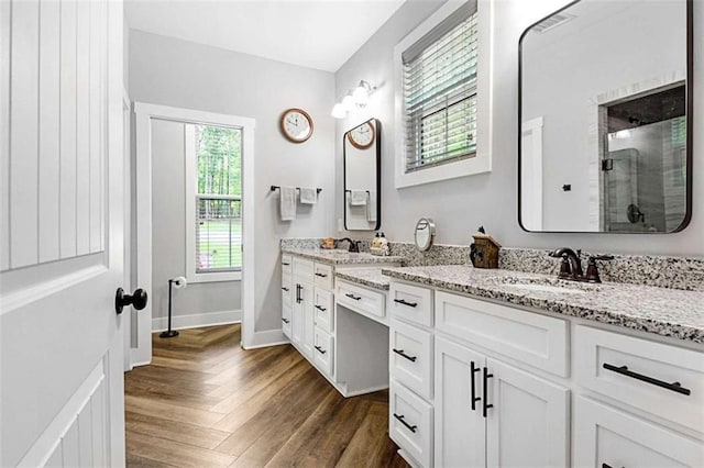 1505 Willis Rd, Barnesville, GA 30204 - bathroom with double vanity and a tile shower
