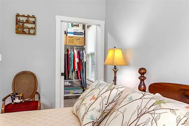 1505 Willis Rd, Barnesville, GA 30204 - bedroom with a closet, carpet floors, and a walk in closet