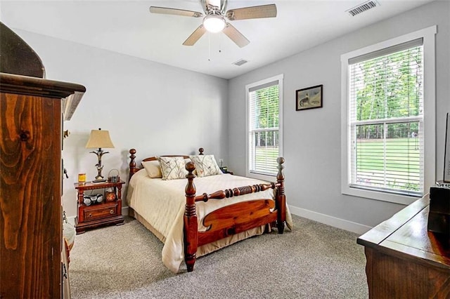 1505 Willis Rd, Barnesville, GA 30204 - carpeted bedroom featuring baseboards and a ceiling fan