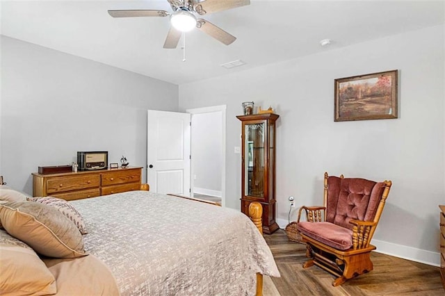 1505 Willis Rd, Barnesville, GA 30204 - bedroom with wood finished floors and a ceiling fan