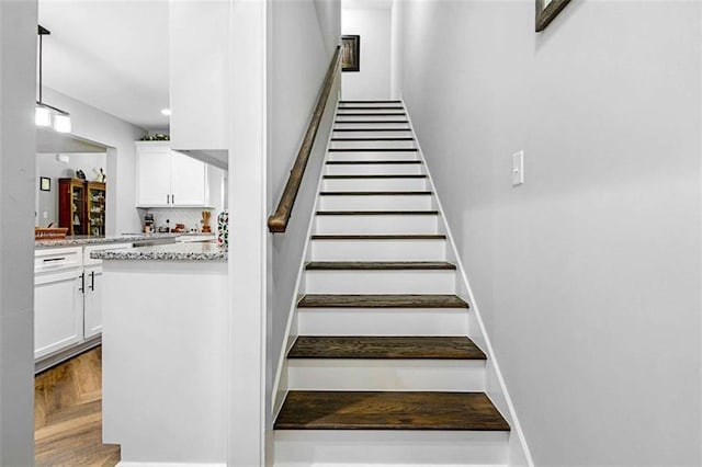 1505 Willis Rd, Barnesville, GA 30204 - stairs with wood finished floors and baseboards