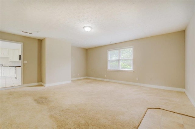 1187 Dixie Rd, Covington, GA 30014 - unfurnished room with light carpet and baseboards