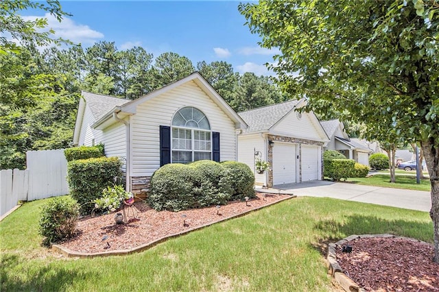 3198 Liberty Commons Dr, Kennesaw, GA 30144 - view of front of home featuring a garage, roof with shingles, stone siding, and concrete driveway