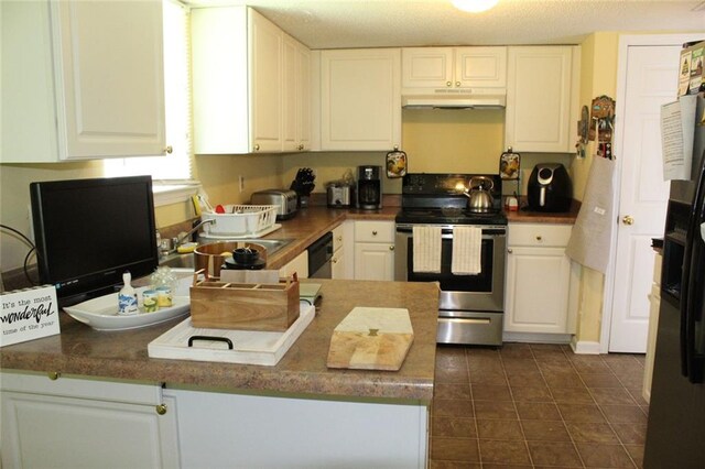 kitchen with white cabinetry, sink, and electric range