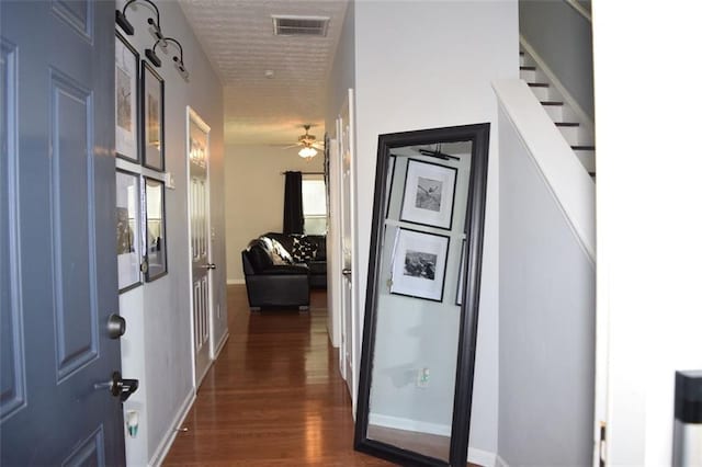 hallway featuring dark hardwood / wood-style floors