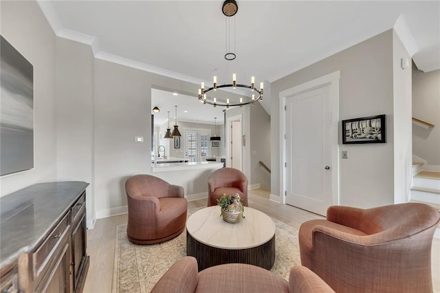 living room with crown molding and light hardwood / wood-style flooring