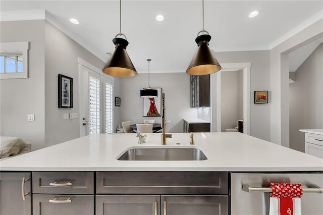 kitchen with sink, a center island with sink, ornamental molding, dishwasher, and pendant lighting