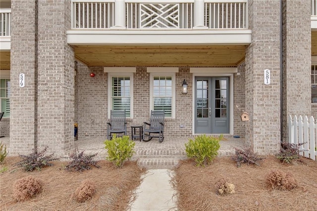 doorway to property featuring french doors and a balcony