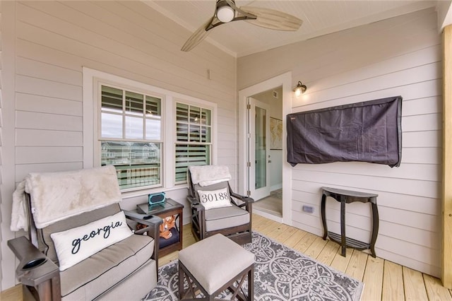 exterior space featuring ceiling fan