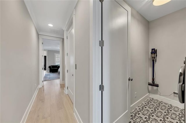 corridor featuring light wood-type flooring