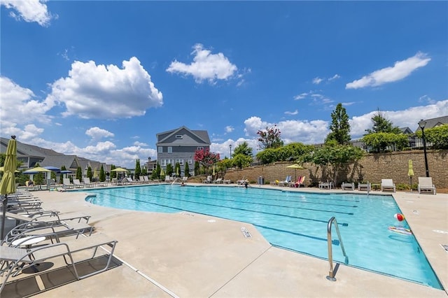 view of swimming pool featuring a patio