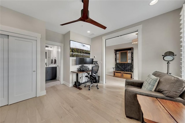 office area featuring ceiling fan and light hardwood / wood-style flooring